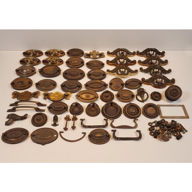 This listing is for a beautiful collection of authentic antique brass hardware handles and pulls.. These handles are...