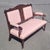 Super fine and stylish Victorian era Edwardian style 1880s settee. Featuring pink floral Edwardian fabric carved frame...