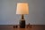Ceramic table lamp manufactured by Søholm Stentøj, Denmark, circa 1960s. It features a shiny brown glaze on a textured...