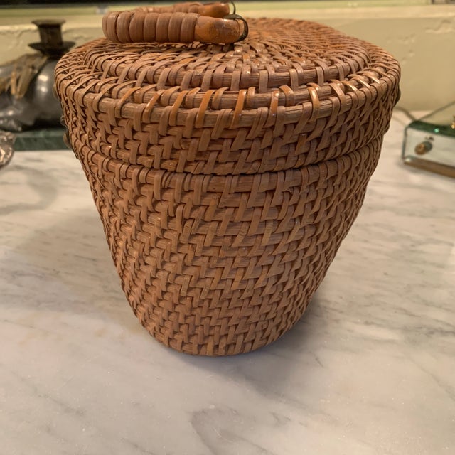 Here we have a beautiful little mid century Asian Chinoiserie basket in the shape of a purse. Darling brass hardware with...