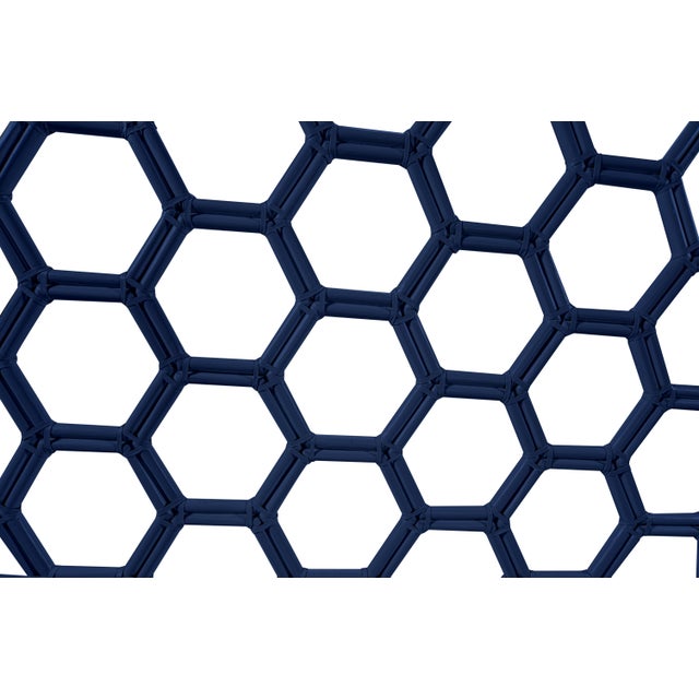 Add a touch of modern charm to your bedroom with the beautifully crafted Honeycomb bed. Handcrafted from natural rattan...