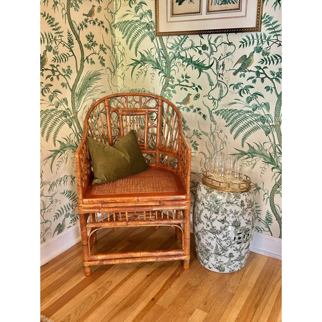 This is a vintage Brighton Pavilion-style armchair crafted of natural bamboo with a warm tortoiseshell or scorched finish...