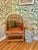 This is a vintage Brighton Pavilion-style armchair crafted of natural bamboo with a warm tortoiseshell or scorched finish...