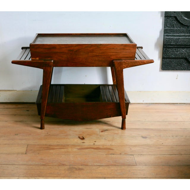 André Paccard side table, 1950s Storage under the tabletop (wood grain on the surface), marks on the wood and small...
