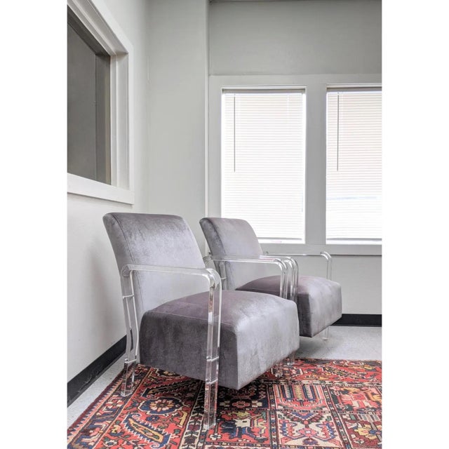 Great condition, contemporary lounge chairs with thick acrylic frames. Used for staging only; extremely comfortable and...