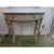 Stunning pair of Italian Neoclassical style painted and gilt wood console tables. This matching pair of Italian painted...