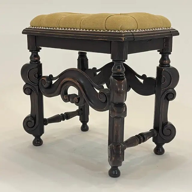 Beautiful antique Baroque stool or bench, rendered in a hand carved oak frame with stunning scroll detail and upholstered...