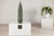 This tall artisan ceramic vase presents a striking, architectural silhouette, rising to an impressive 31 inches in height....