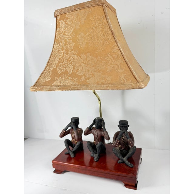 Super cool Wise Monkeys Table Lamp with Shade. Cast Iron Monkeys in uniforms and sitting on a wood base
