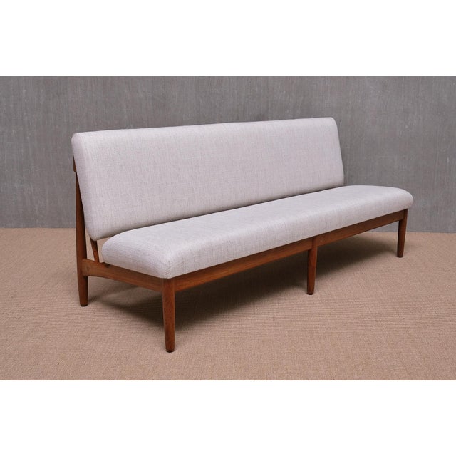 This exceptionally rare freestanding sofa was designed by Poul Volther and produced by the cabinetmaker Erhard Rasmussen...