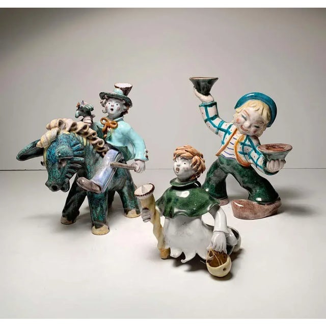 A group of 3 Austrian ceramic figures attributed to Leopold Anzengruber. Manner of Walter Bosse and the Wiener Werkstatte...