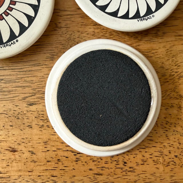 Incredible set of 3 Acoma pottery coasters, each with a different animal motif: a bear, bison, and hummingbird. Signed...