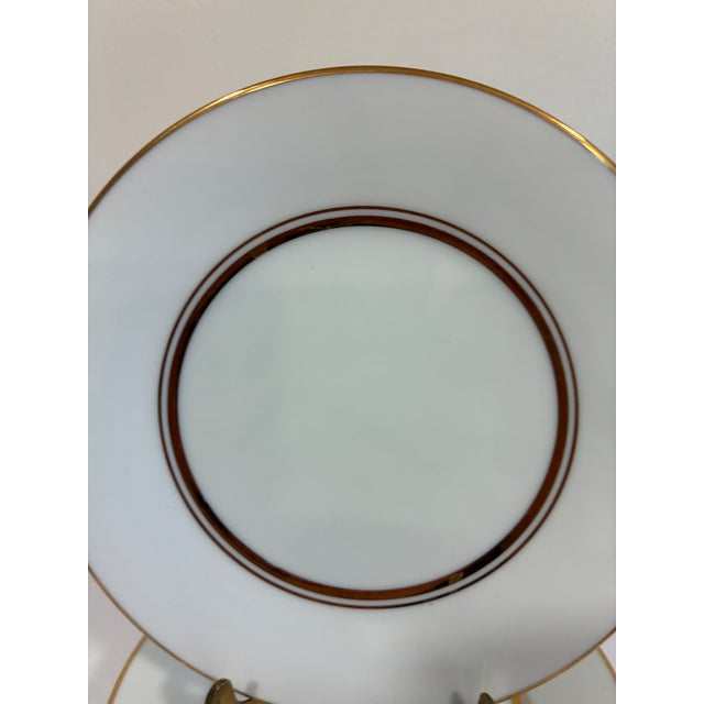 An elegant vintage find for the collector of fine china — this set of eight Noritake plates in the Gloria pattern (6526)...