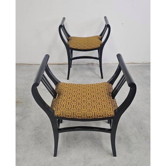 Pair of spectacular Vienna Secession Causeuses or Gondola stools. The stools feature gondola shaped armrests done in black...