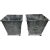 A pair of neoclassical style metal cache pot planters with tapered lines and ring pulls. Planters are grey in color with...