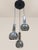 This chrome-plated metal cascade lamp with three shades, model "Symphonie," was produced in the 1970s by Euroline in...