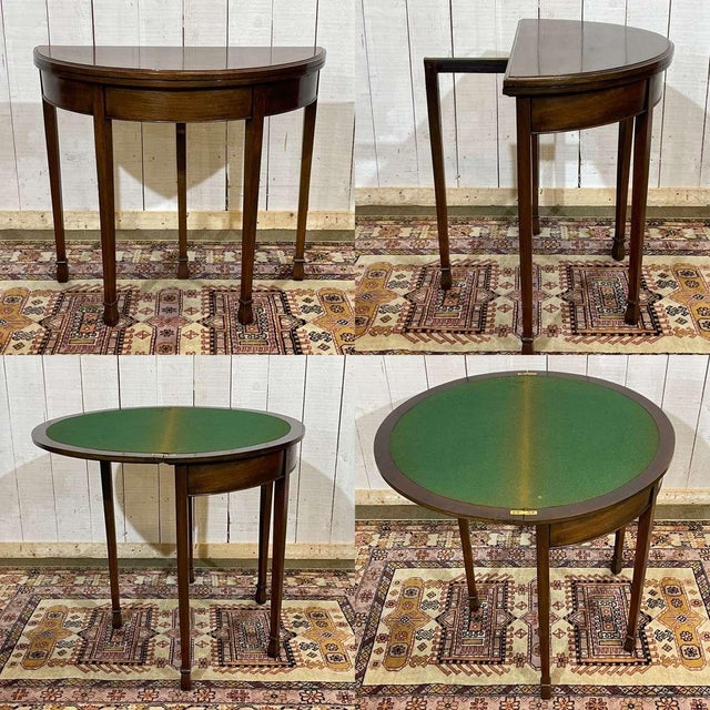 Early 20th-century English mahogany games table. Open dimensions: Diameter 86cm, Height 73cm; Closed dimensions: Length...