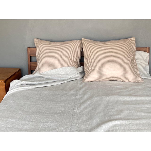 This is a beautiful subtle stripe that can fit into any decor. Medium-weight 100% linen Imported from the Czech Republic....