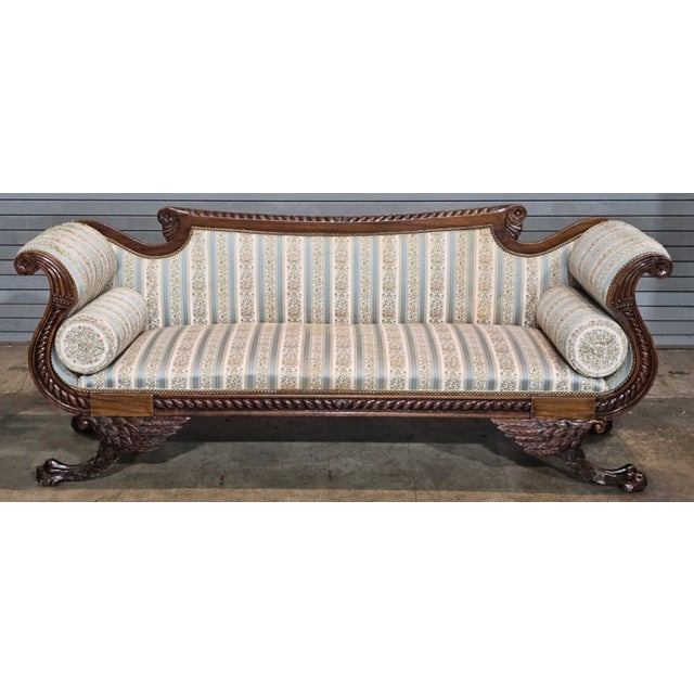 Store Item: Antique American Empire Style Carved Mahogany Sofa Wing Legs Claw & Ball Feet Description: This sofa features...