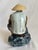 This is a Chinese Mudman figurine, also known as a Shiwan Mudman, which is a type of collectible ceramic figure. Mudmen...
