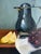 Vintage Acrylic Still Life Painting of a Silver Coffee Pot, Lemon Slices and Grapes on board. A beautiful addition to your...