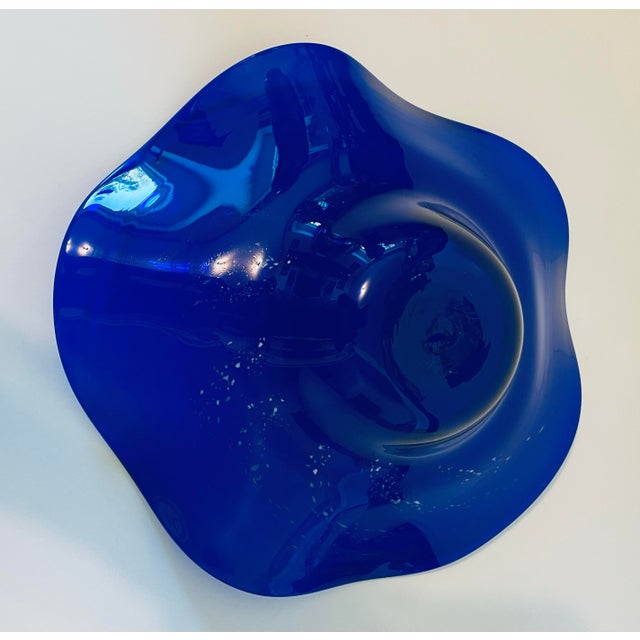 Elevate your space with this striking, authentic 1988 studio art glass centerpiece bowl by renowned American glass artisan...