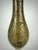 A beautifully hand-engraved vintage silver-tone metal vase, handcrafted in India circa 1965–1980. This elegant trumpet-...
