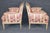This elegant pair of French painted and parcel-gilt bergère armchairs, attributed to Maison Jansen and dating to the...