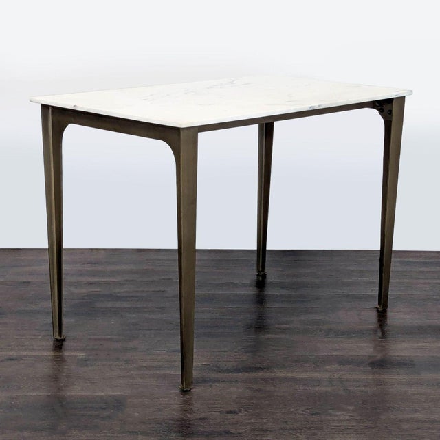 In the French kitchen style, the industrial type table is covered by an authentic 3/4-inch slab of white Carrara marble...