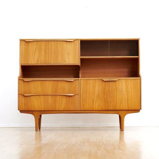 This vintage mid-century buffet credenza was produced by&nbsp;Sutcliffe of Todmorden during the 1960s. A fantastic design...