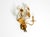 1960s gold-plated Florentine wall lamp with two sockets. Beautiful design with many details. The beige leaves are hand-...
