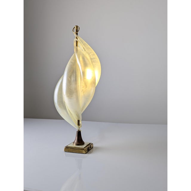 This sculptural table lamp by Maison Rougier embodies the sophistication of 1970s Canadian Hollywood Regency style. The...