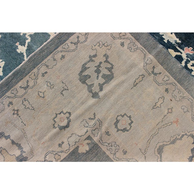 Large Turkish Oushak Rug With Dark Teal Blue Background & Ice Blue Border For Sale - Image 12 of 12