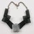 This stunning modernist choker features a handmade geometric bib necklace. Each extra-thick block of Lucite is hinged,...
