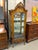 Design Plus Gallery presents a Vintage French Louis XV Style Giltwood Curio Display Cabinet. This ornate cabinet showcases...