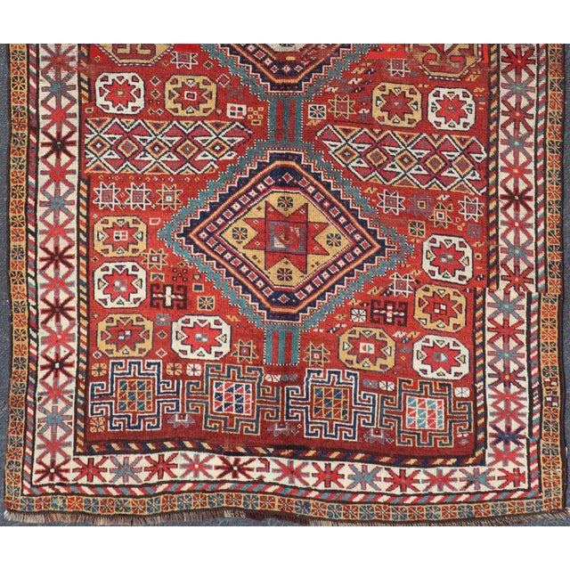 Antique Qashqai Rug With Geometric Motifs in Red, Blue, and Golden Yellow For Sale - Image 4 of 13