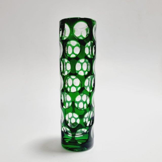 A stunning Mid-Century Modern optical crystal vase manufactured by the renowned German maker Nachtmann Bleikristall,...