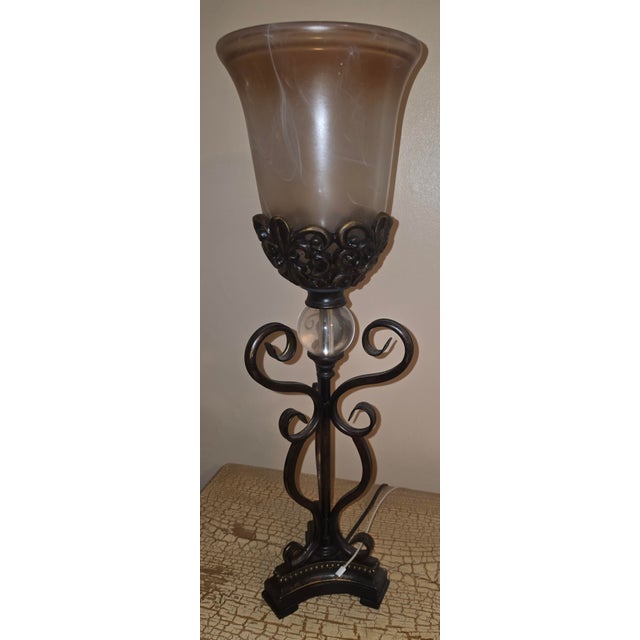Key item features Elegant Design: Features a Mediterranean-style design with scrolled iron accents, a curved beaded base,...