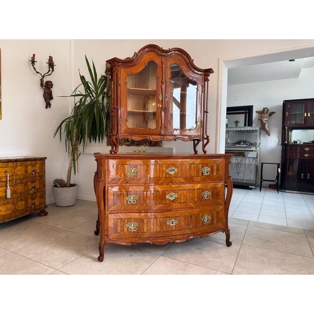 Restored Josephinian Marquetry, Circa 1780. Dimensions: Height x Width x Depth 193 x 132 x 69 cm. For sale is a beautiful...