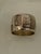 Multiple ornamental figures engraved along the exterior of the ring “TURKEY” letters are engraved inside the ring Vintage...