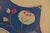 This Chinese embroidered silk child’s collar was used for festivals. This collar has scalloped edges and features peaches....