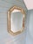 Octagonal giltwood mirror with frame, Hollywood Regency style, produced by the Belgian manufacturer Deknudt in the 1970s....