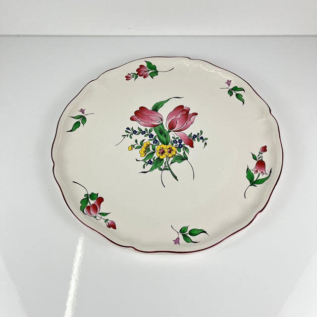 KG Lunéville cake plate, "Réverbère" model, tulip motif Dimensions: Diameter: 34 cm Height: 2 cm Very good overall...