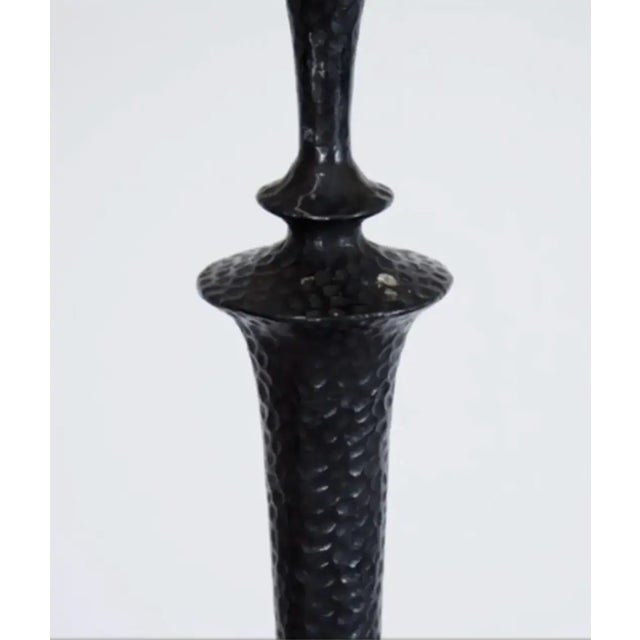 One solid bronze cast modern floor lamp in the manner of Giacometti or Jean Michel Frank. Lamp is cast in solid bronze...