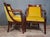 Pair of Empire style mahogany armchairs with dolphin motifs – 19th century An elegant pair of Empire style armchairs in...