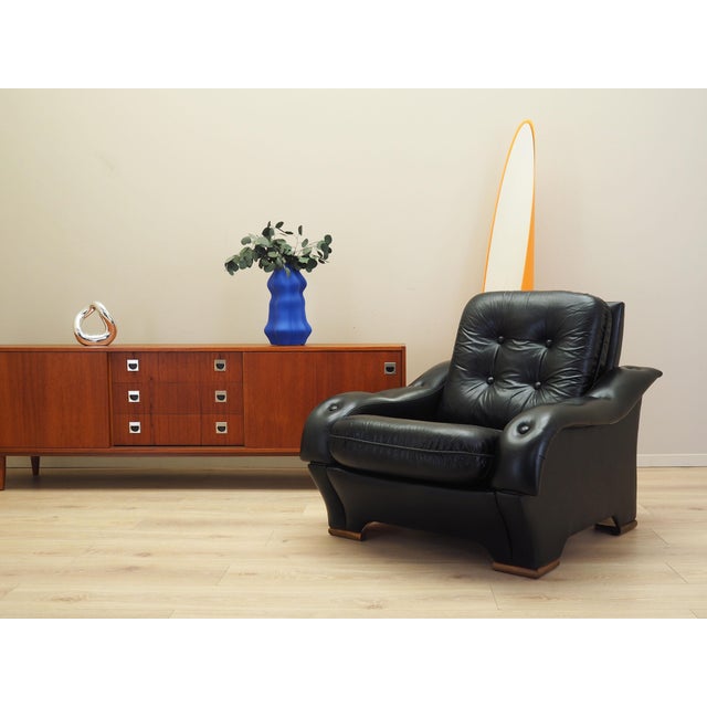 The armchair was made in the 1980s, Italian manufacture. Legs made of solid wood. The armchair is covered with original,...