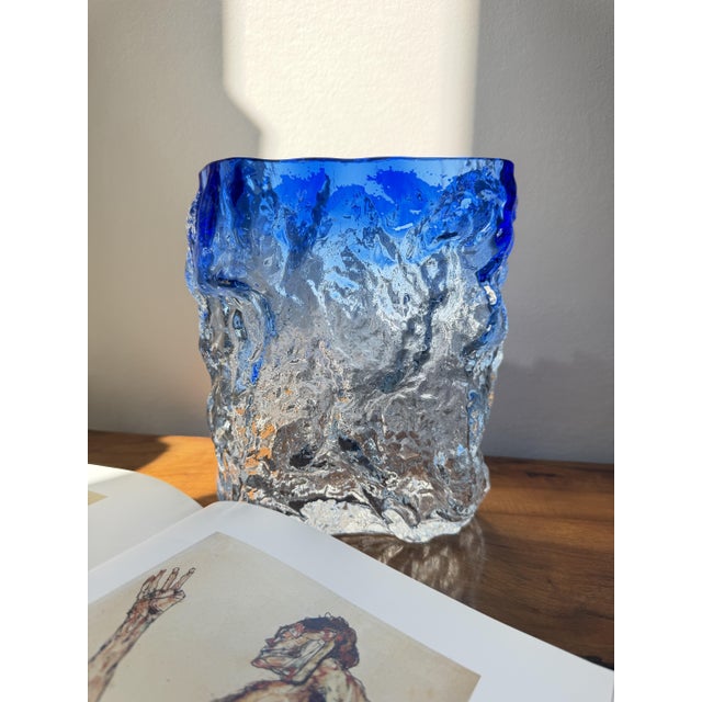 A large, heavy art glass vase designed by Kaj Blomqvist for Kumela Oy, Riihimäki, and made in the 1970s. The whole surface...