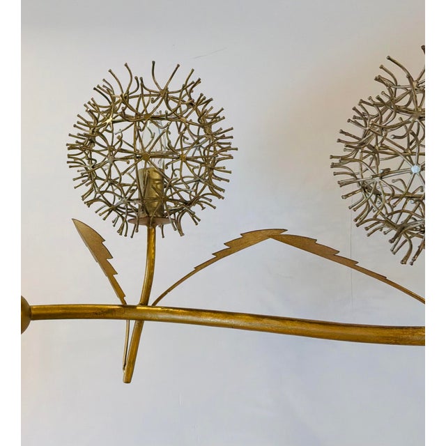 Original retail $3940, stylish Currey & Company ModernSilver and Gold Dandelion Chandelier, showroom floor sample