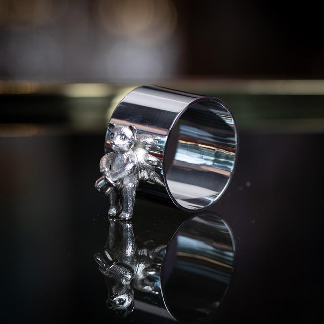 A 20th century english solid silver napkin ring of heavy gauge, crafted by asprey of london. Designed in a timeless plain...