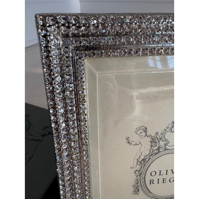 Lovely frame. Never used. In original box. Fits a picture 4" x 6".